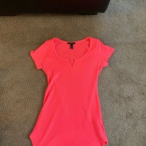 Neon pink short dress.